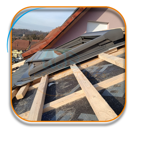 Fenêtre avec charpente apparente en Alsace